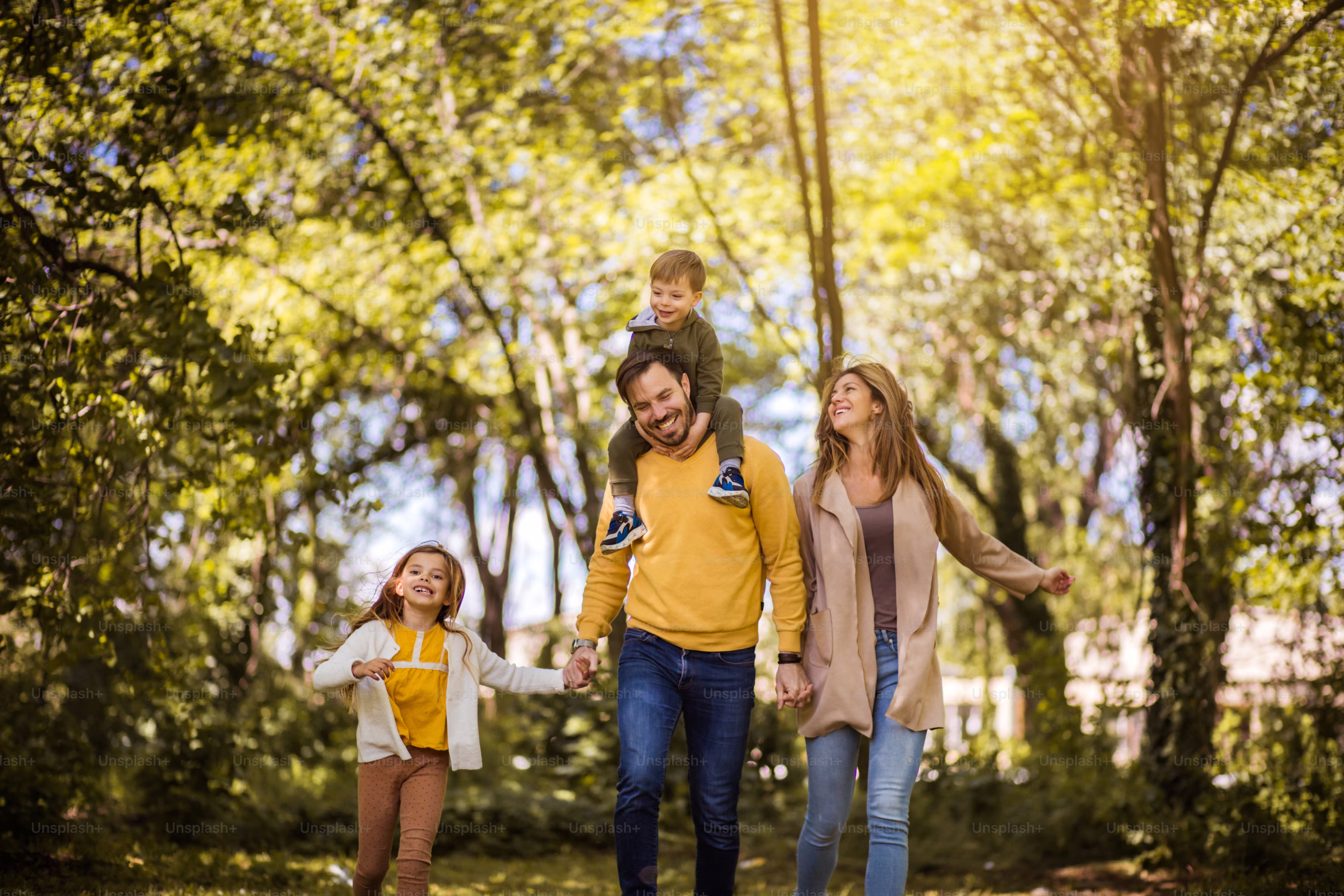 Family walking in forest